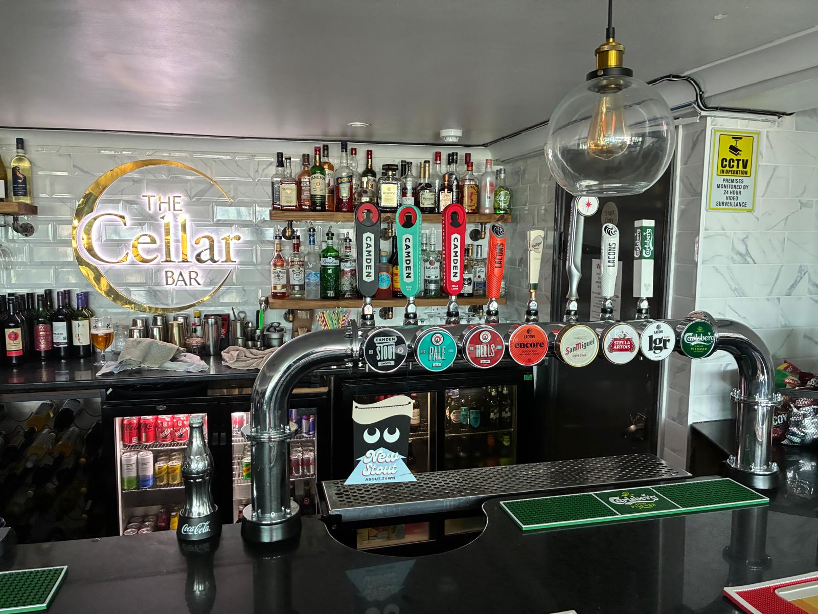The bar taps and back bar at The Cellar Bar